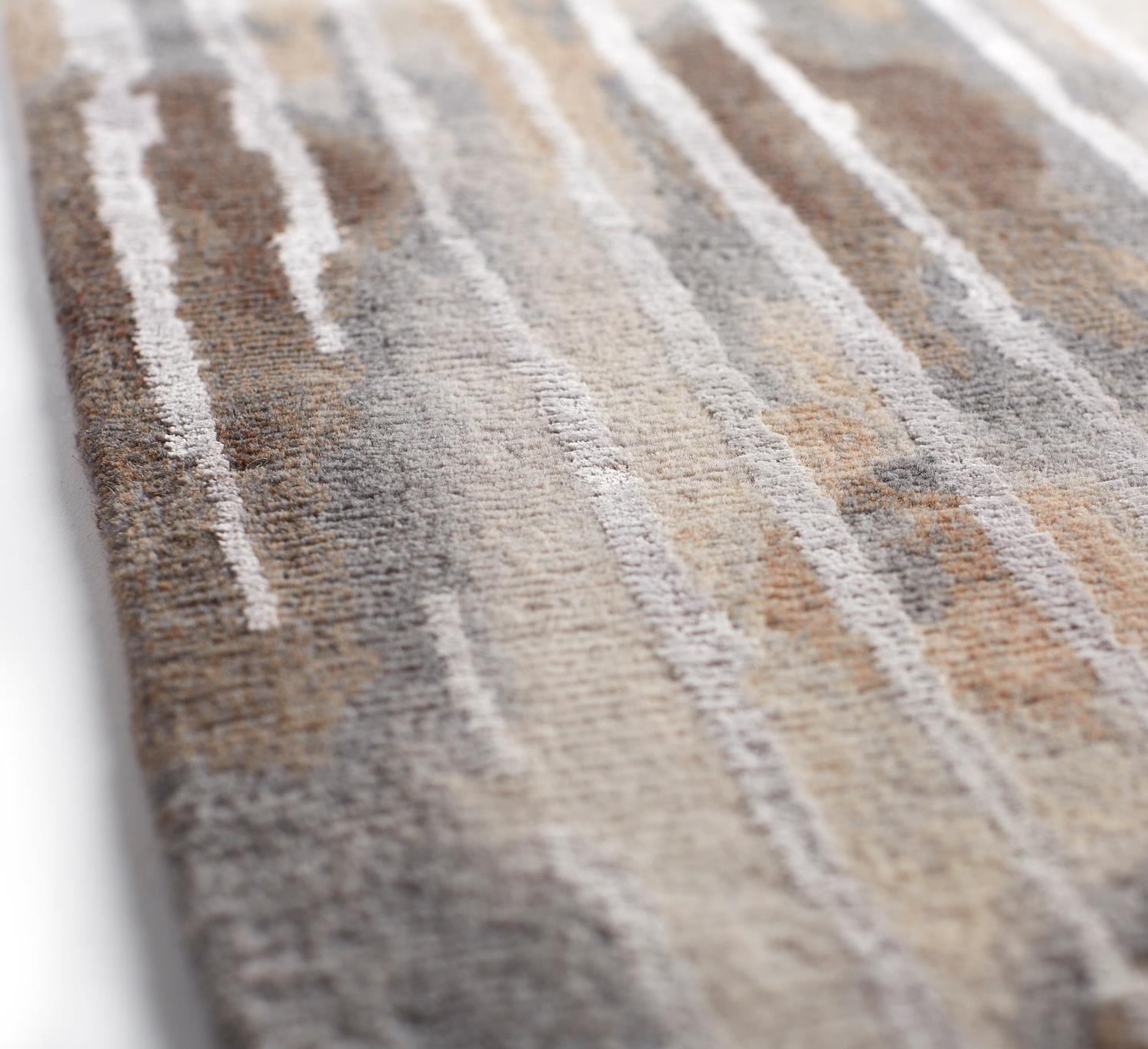 Textured carpet finish that enhances comfort, acoustics, and visual warmth.